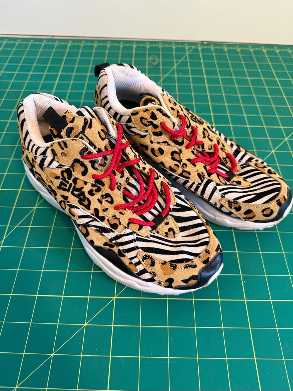 Fila Women's Animal Print Athletic Sneakers in Tan, Black, White with Red Laces